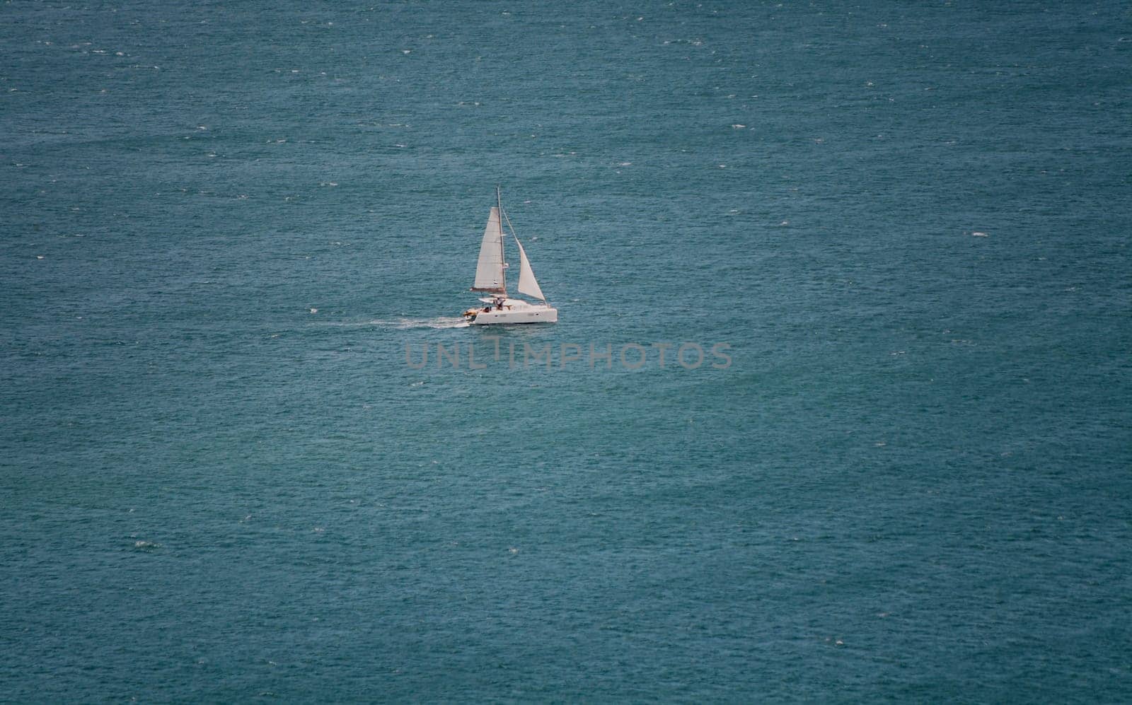 Sailboat sailing in lonely sea, San Juan del Sur