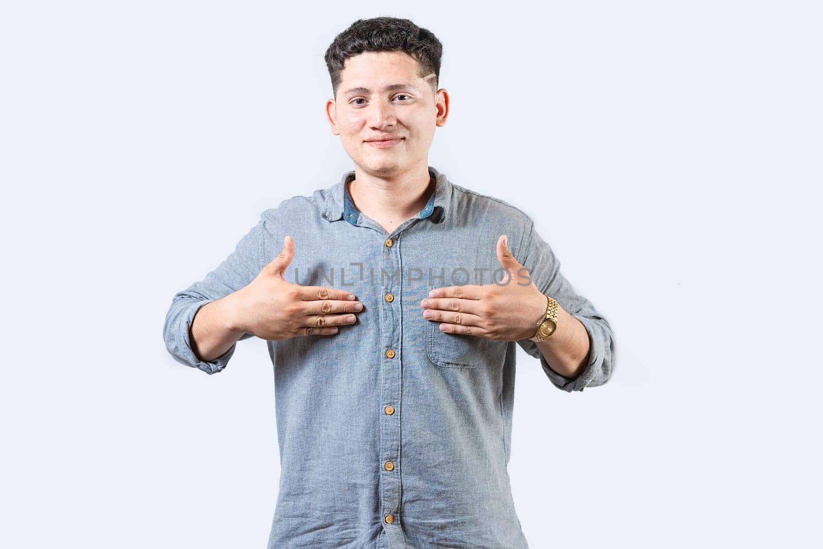 Interpreter person gesturing HAPPINESS in sign language. Smiling young man gesturing HAPPINESS in sign language