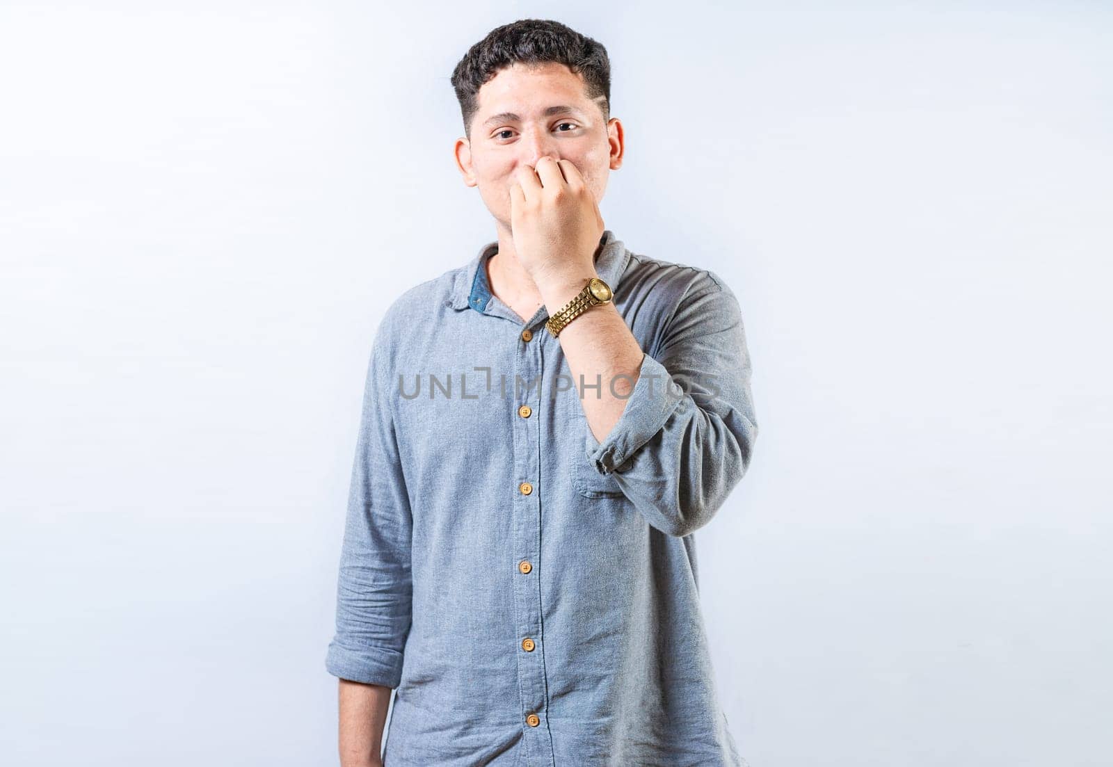 Person gesturing EAT in sign language. Deaf and dumb person gesturing DRINK in sign language. Young man gesturing EAT in sign language