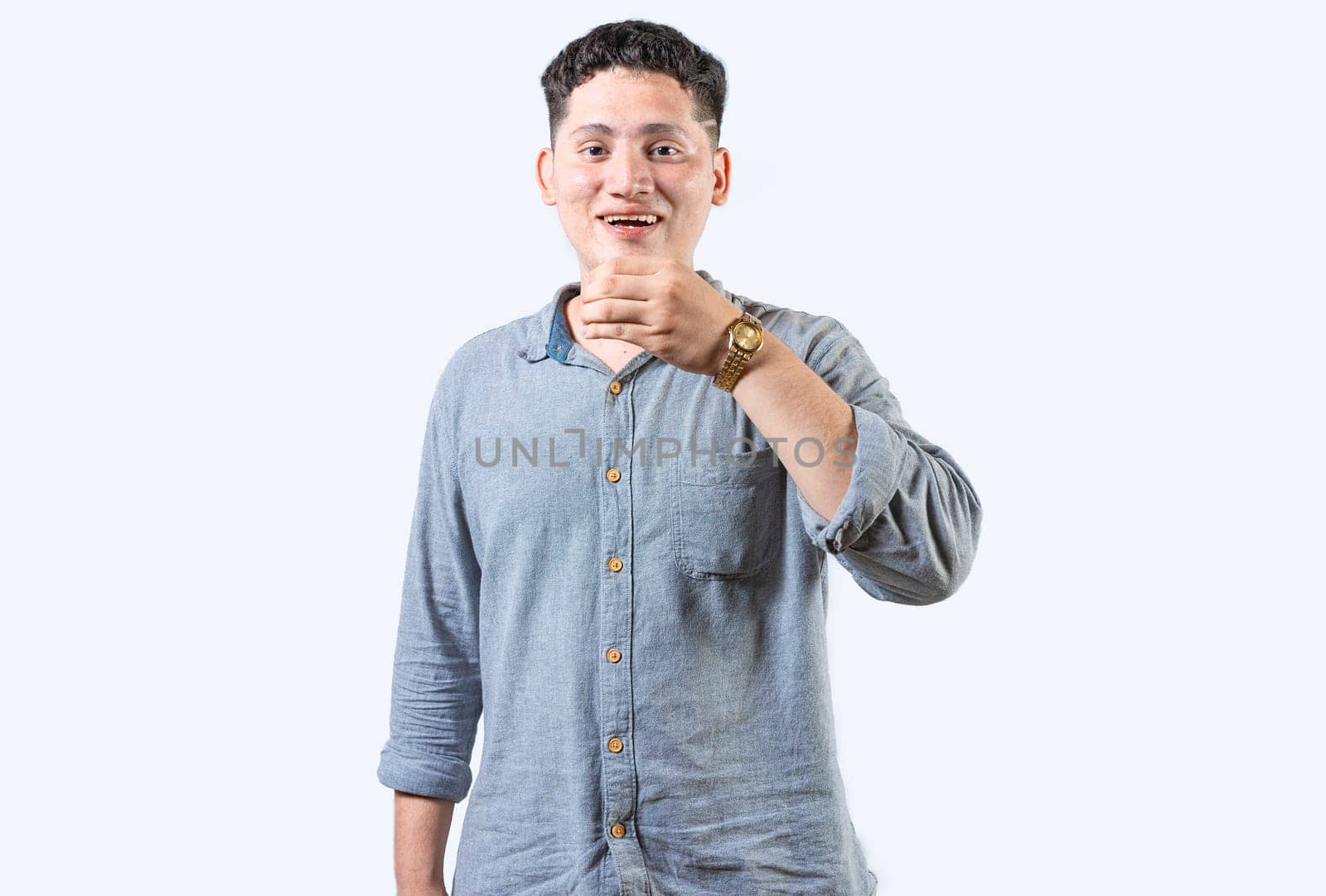 Person gesturing DRINK in sign language. Deaf and dumb person showing DRINK in sign language. Young man gesturing DRINK in sign language isolated