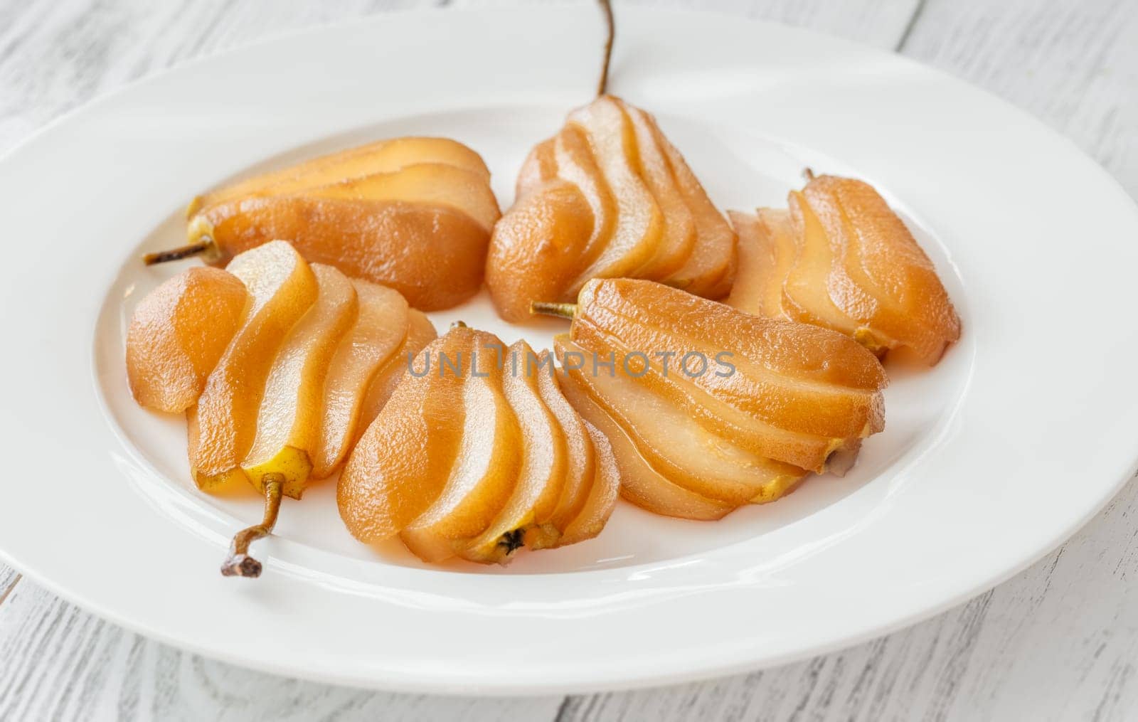 White wine spicy and sweet poached pears