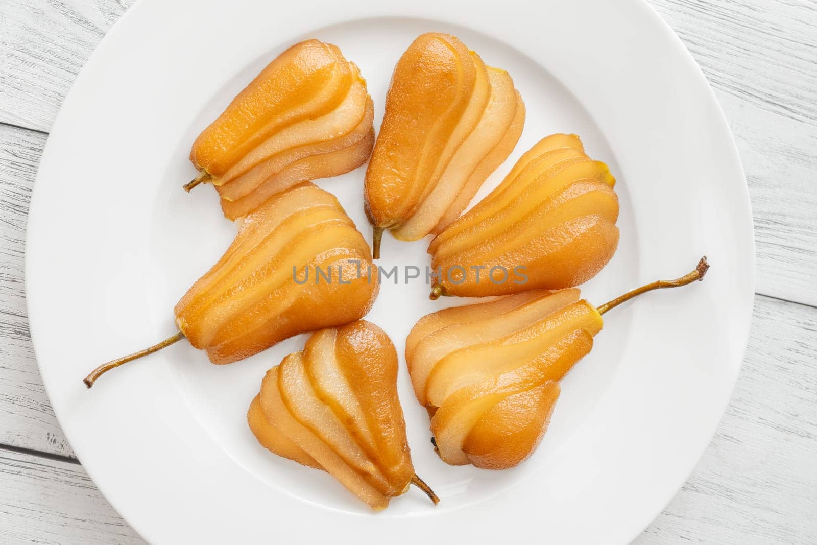 White wine spicy and sweet poached pears