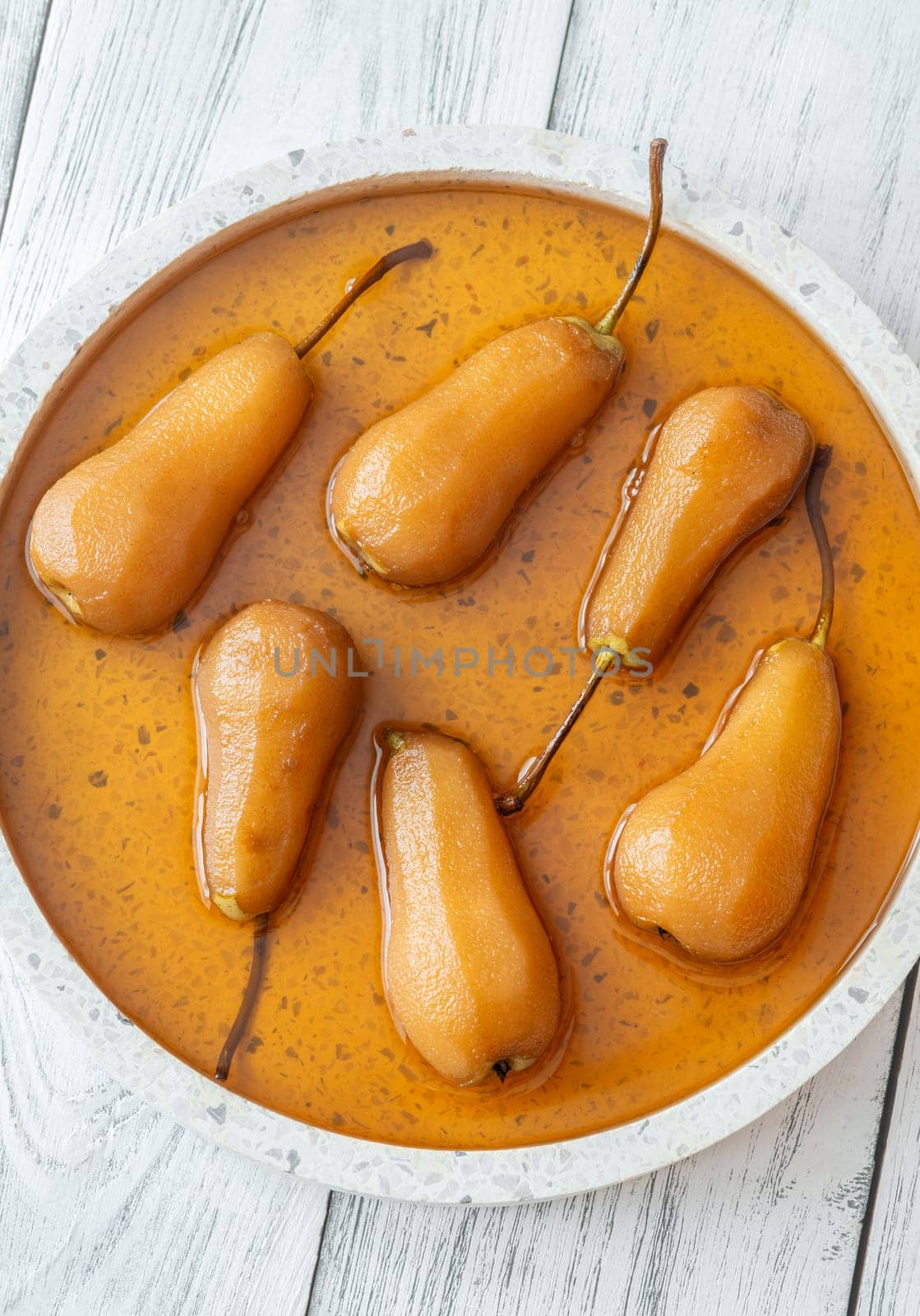 White wine spicy and sweet poached pears