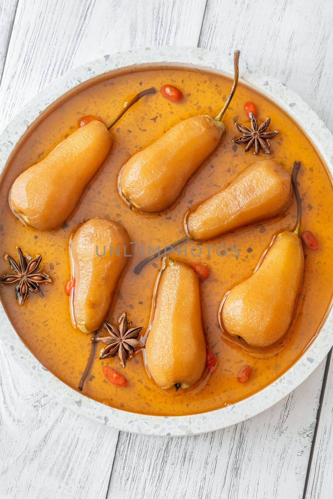 White wine spicy and sweet poached pears