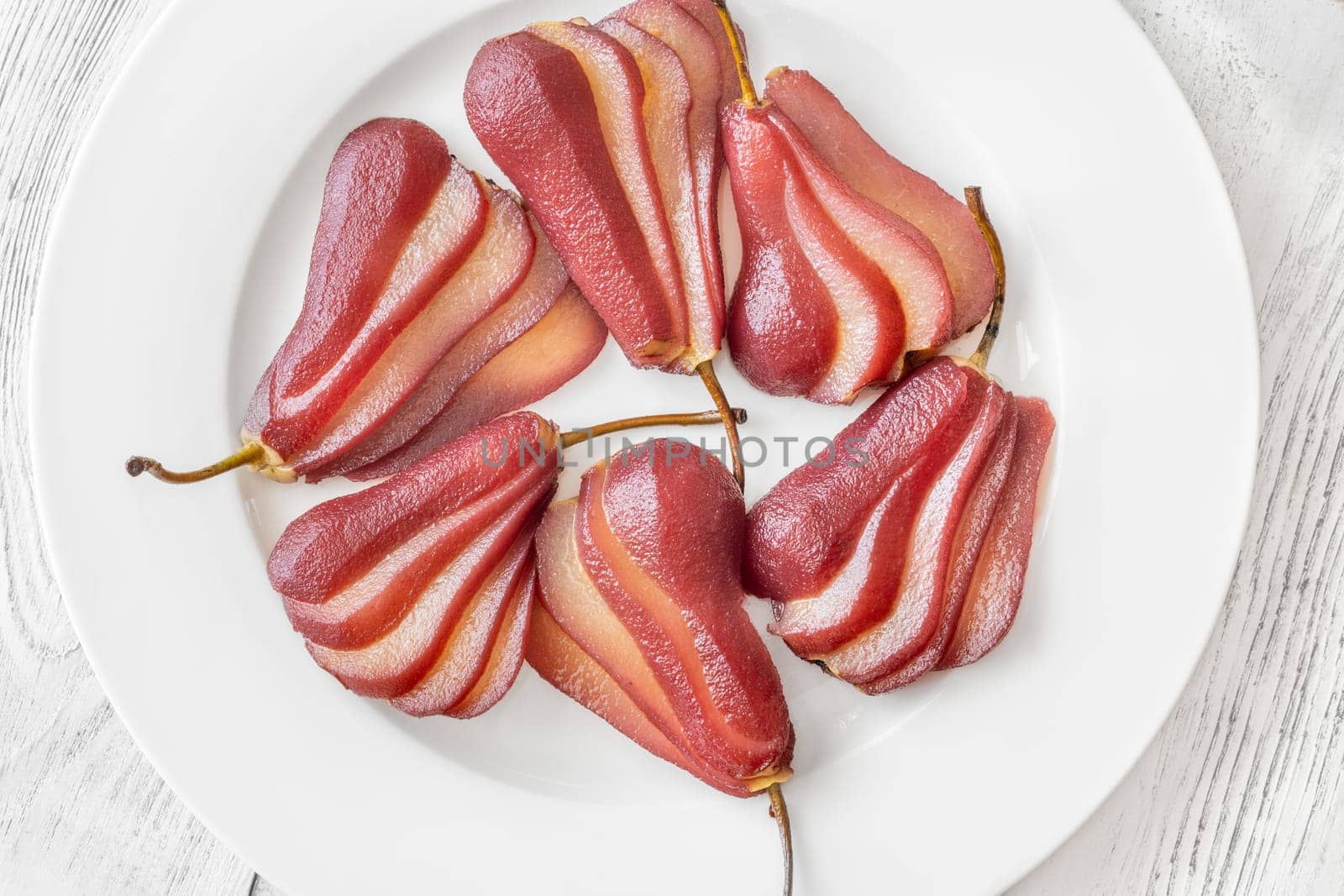 Red wine sweet and spicy poached pears