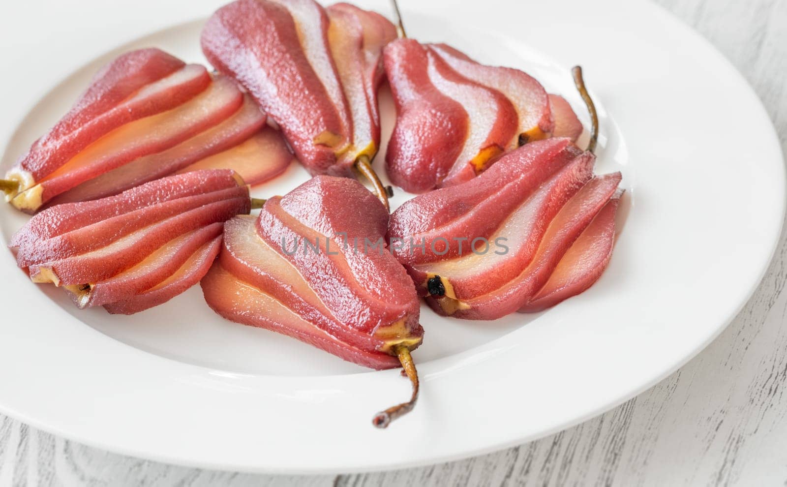 Red wine sweet and spicy poached pears
