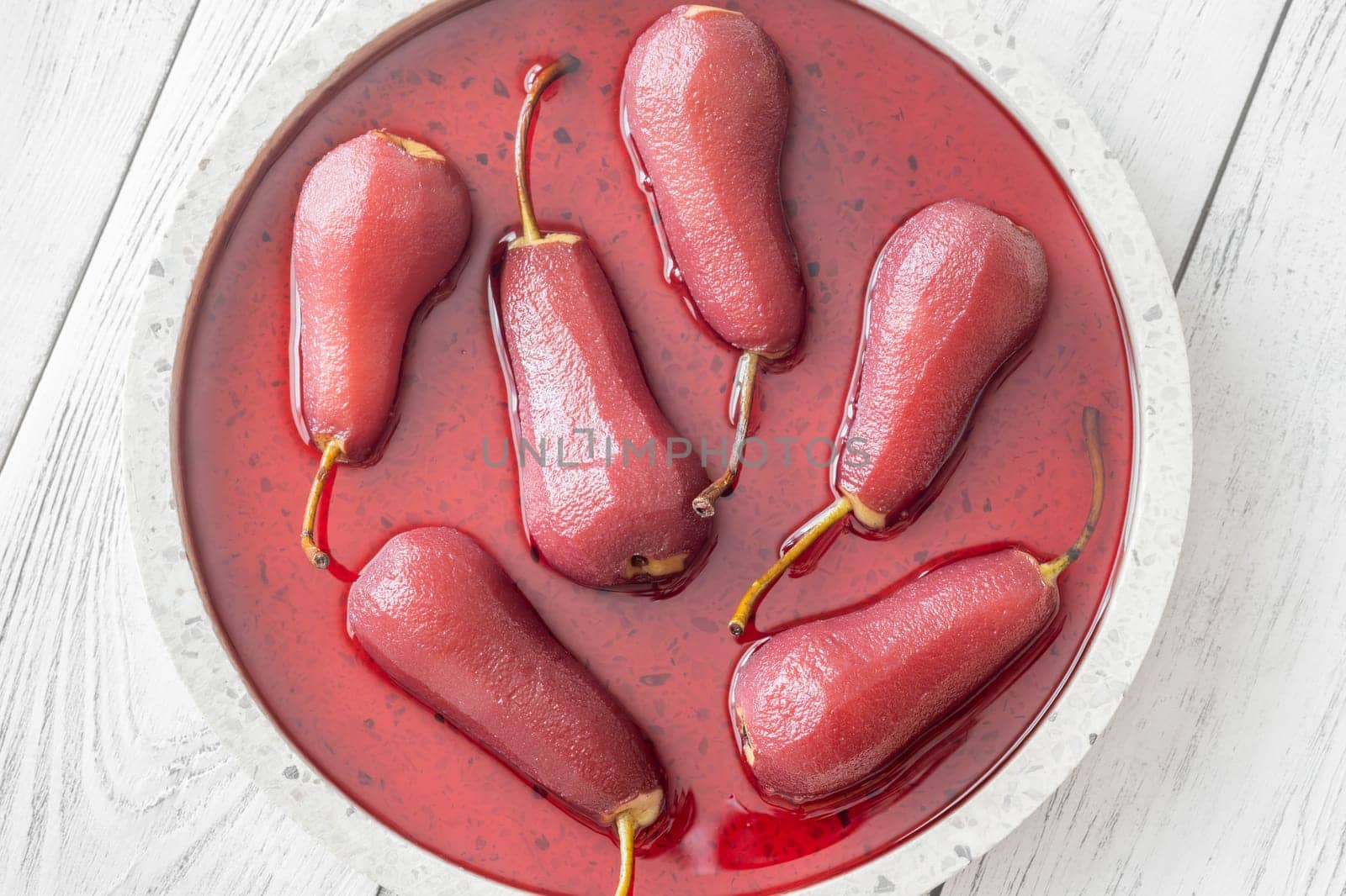 Red wine sweet and spicy poached pears