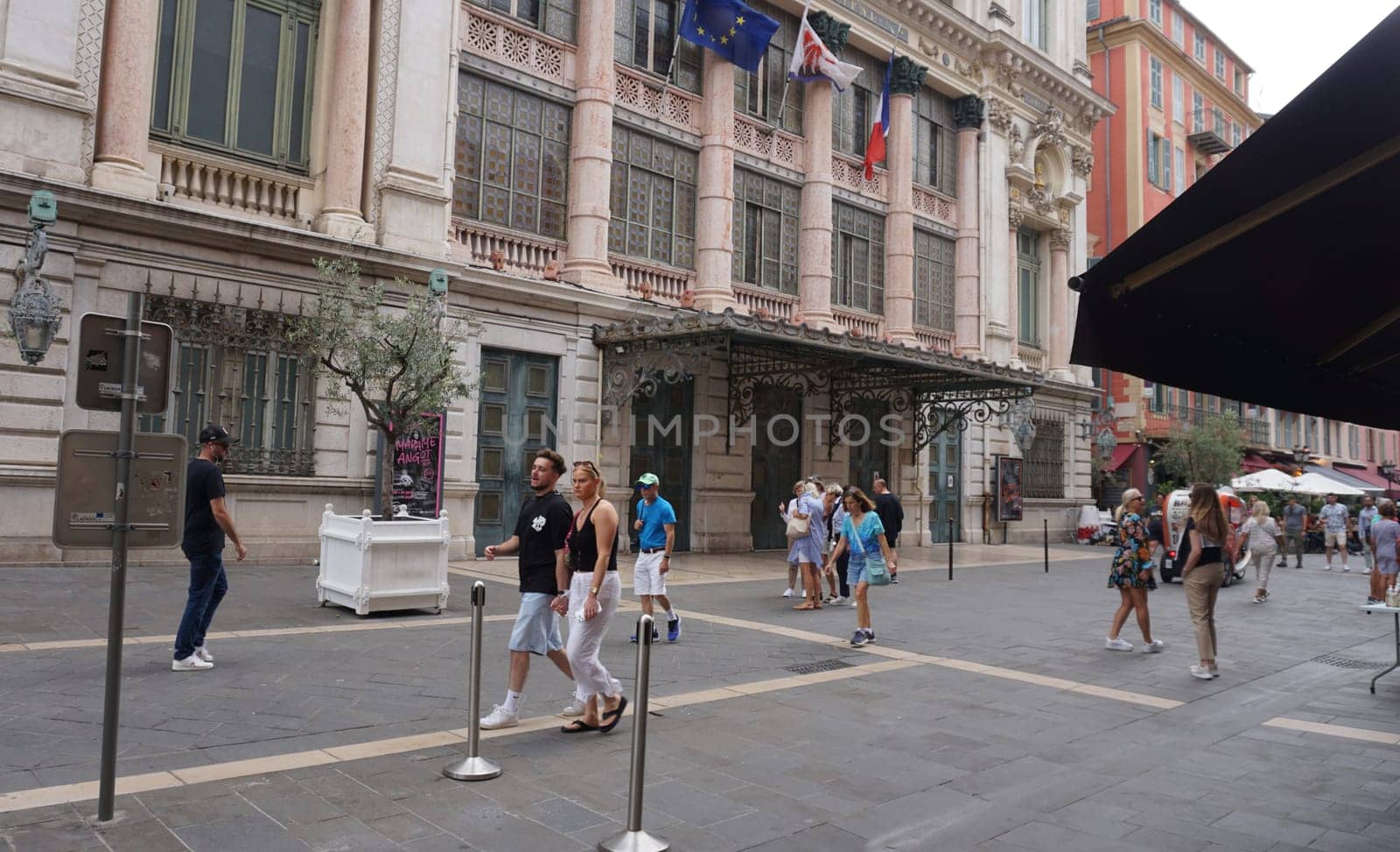 Nice, France - September 22, 2024: People going near building of old opera in Nice , France