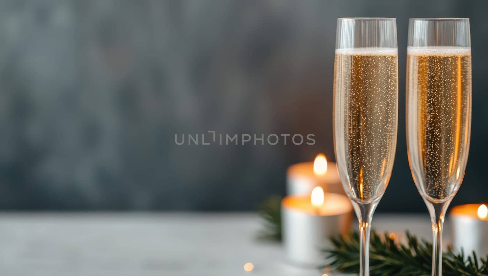 Champagne Glasses and Candles, Festive Celebration Background. Concept of new year.