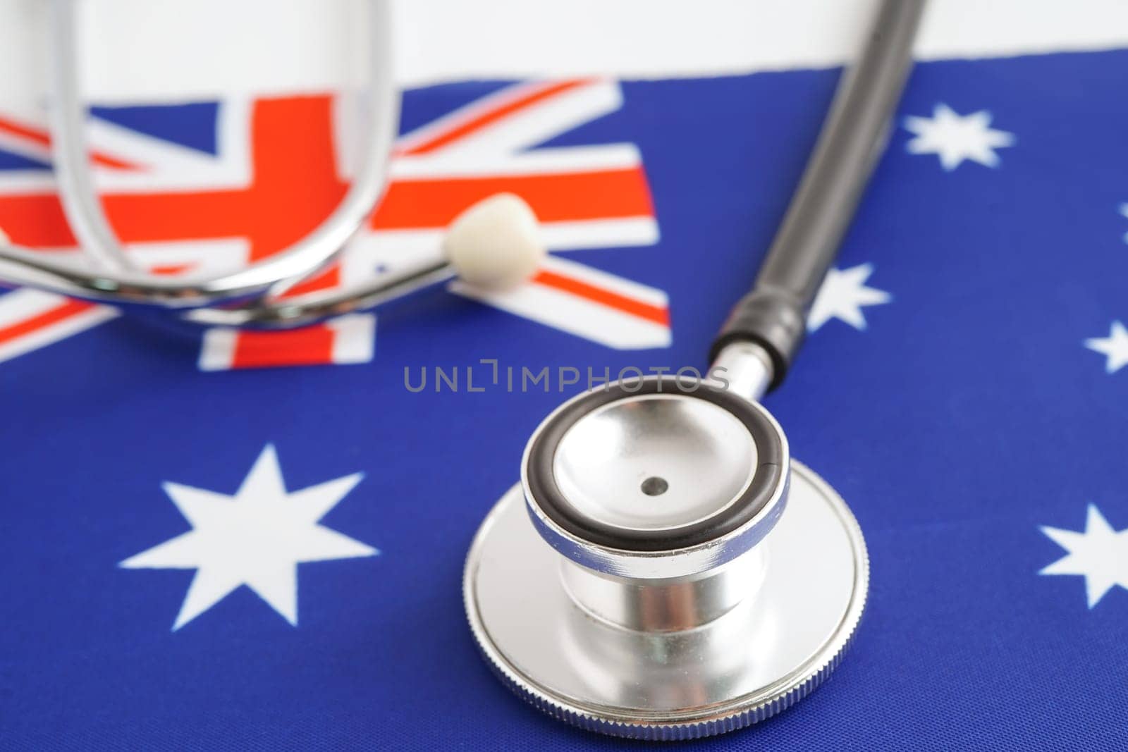 Australia flag with black stethoscope, Business and finance.