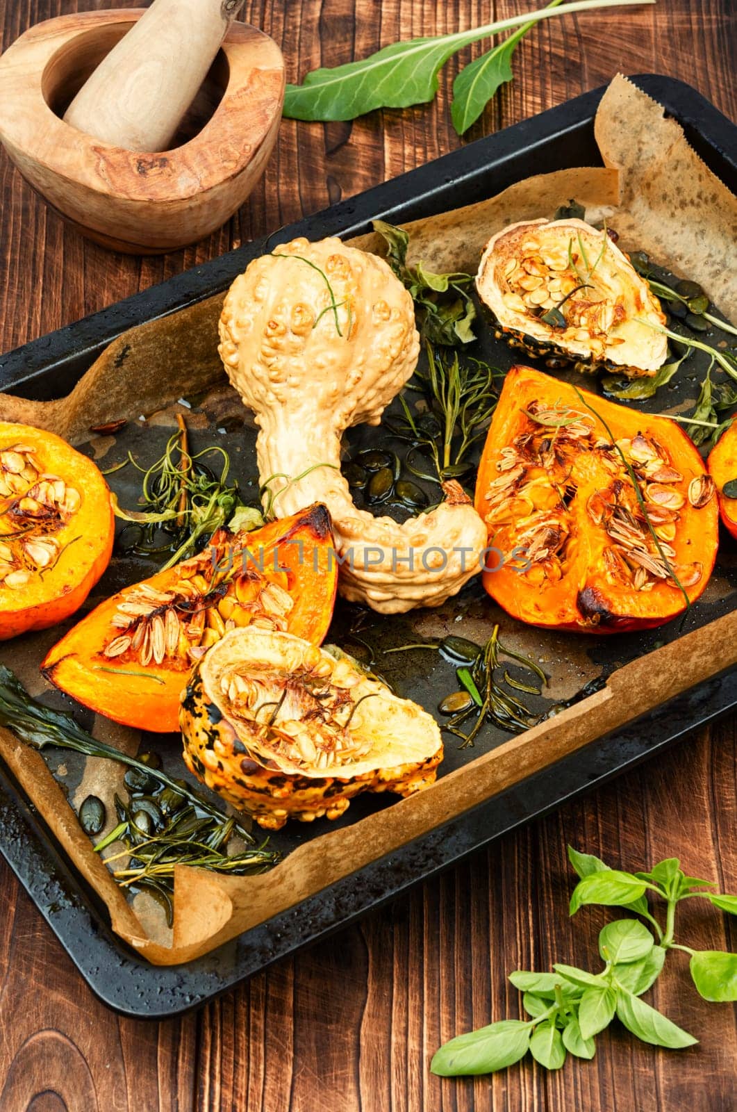 Delicious baked or butternut squash pumpkin with herbs.