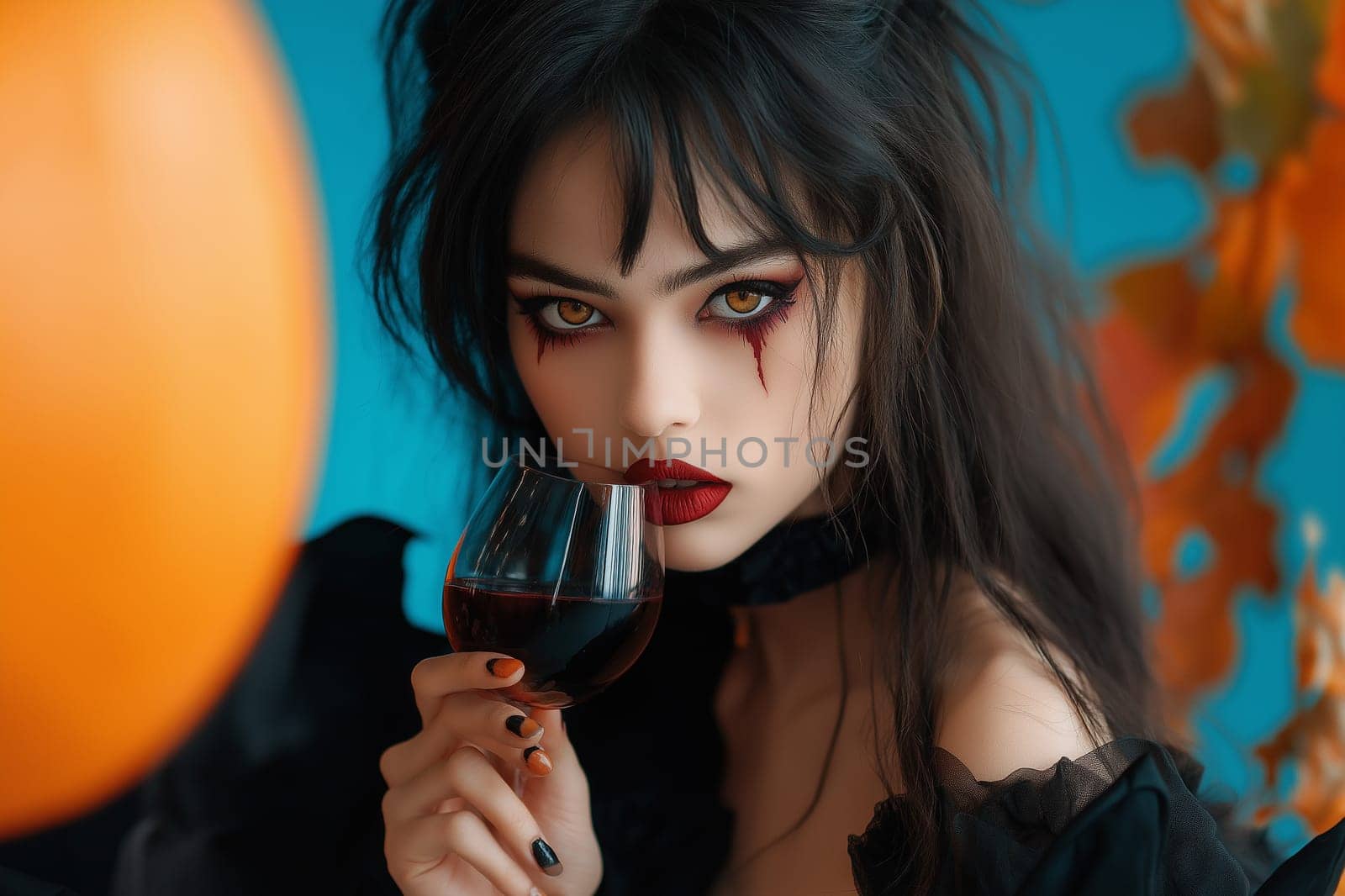 Fashion portrait Elegant Luxury Studio Shot of A cute woman dressed vampire costume drinks wine