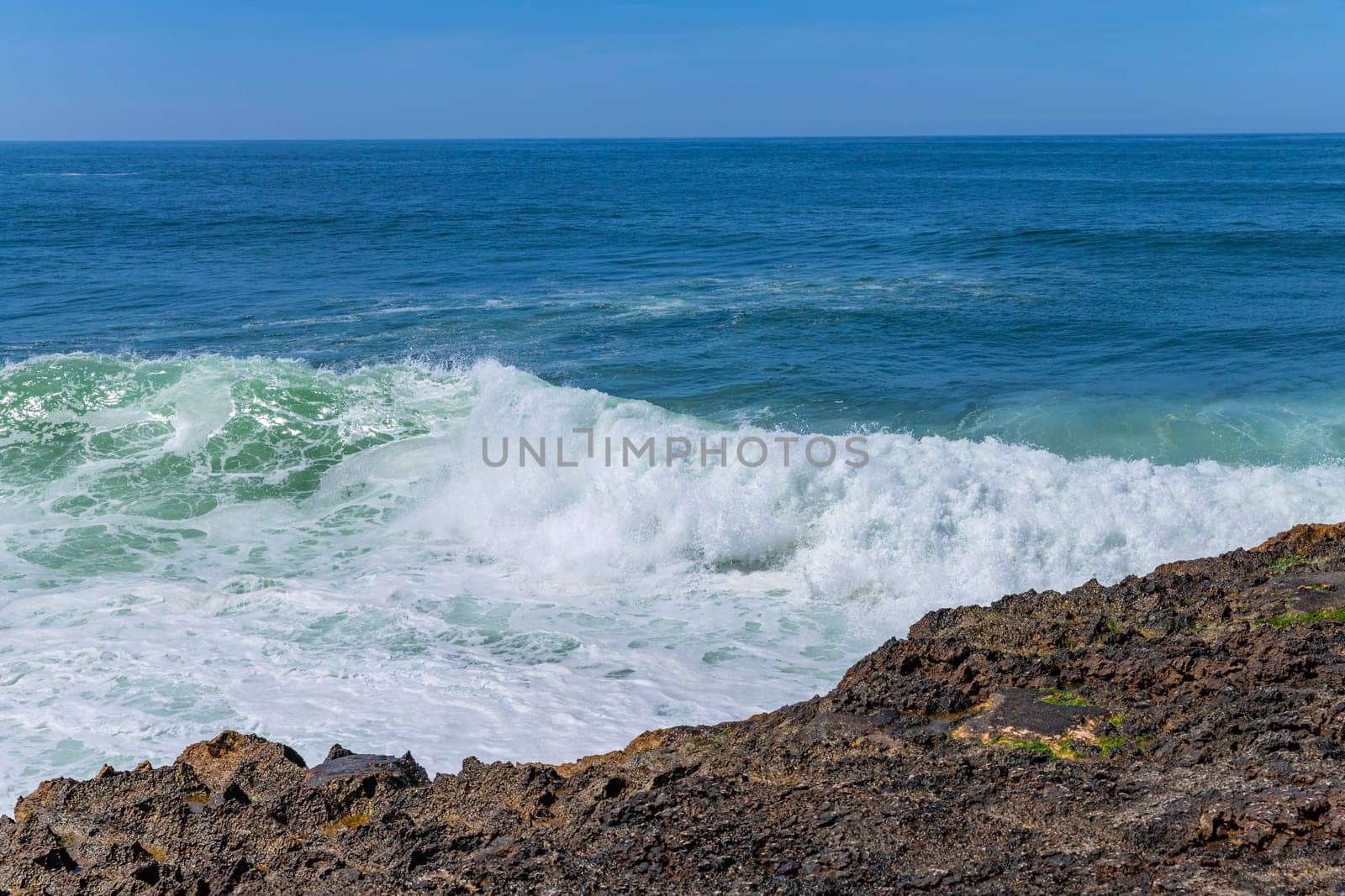 View of ocean waves and fantastic rocky coast in Ericeira, near Lisbon. Portugal