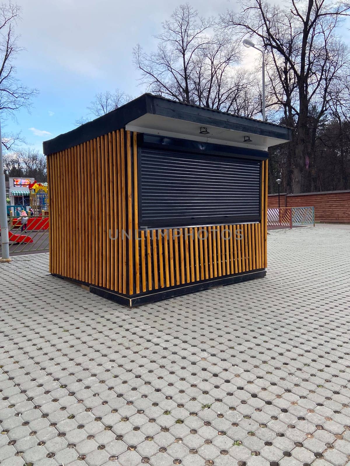 Closed shopping kiosks in the early autumn morning.