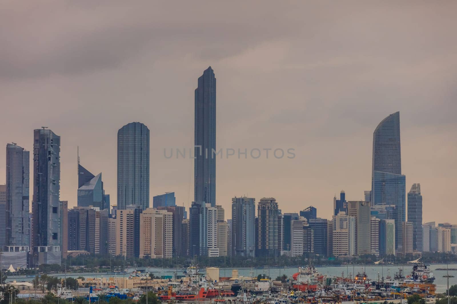Abu Dhabi city in evening. View from the seaport. United Arab Emirates