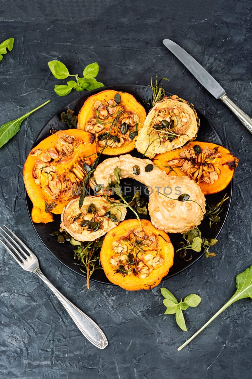 Dish of baked Butternut squashes ready to eat.