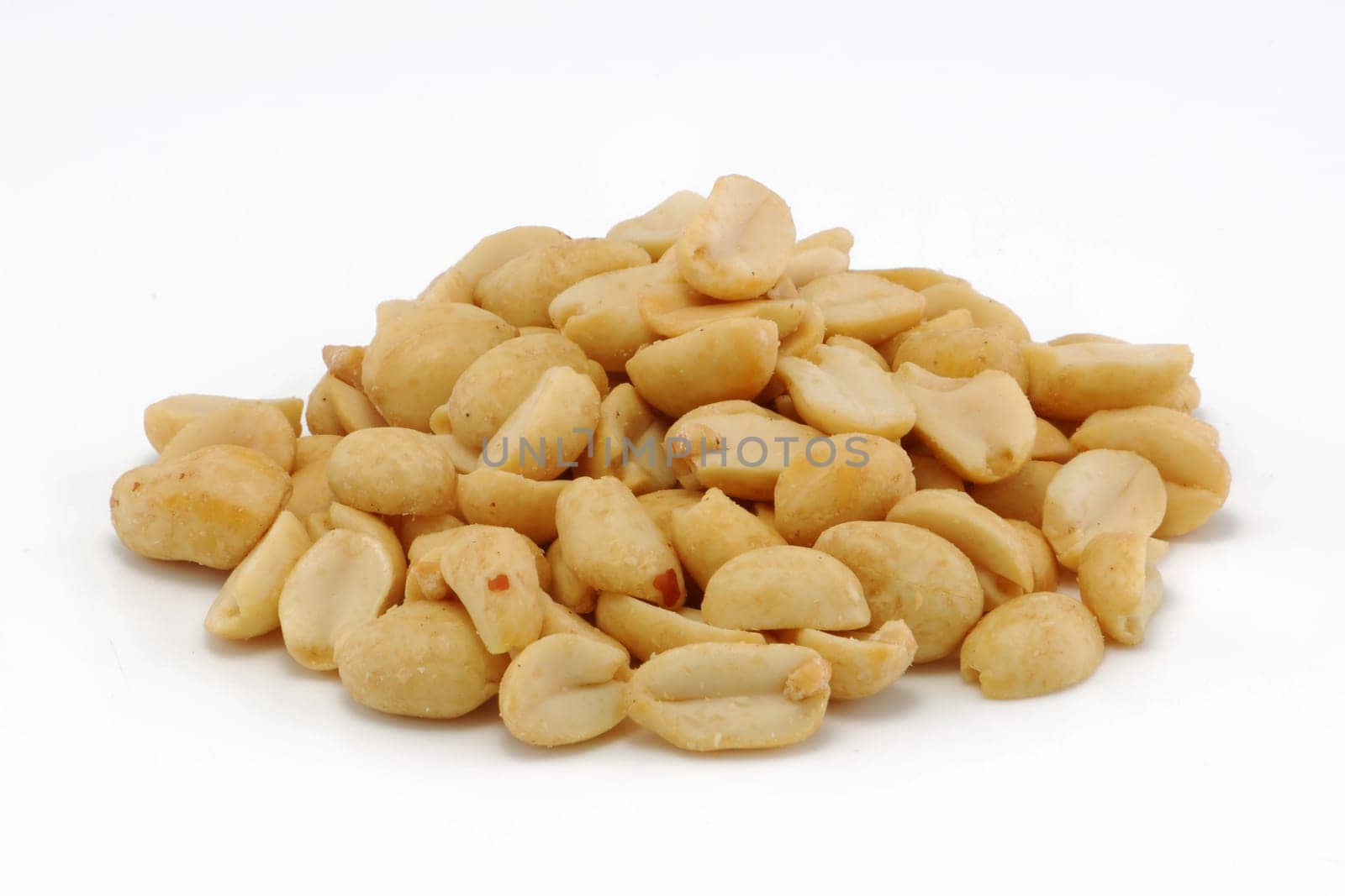 Roasted peanuts group isolated on a white background