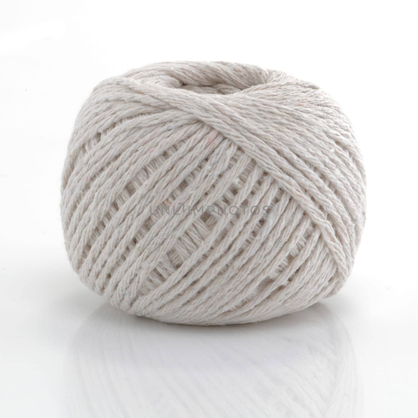 A ball of string on white