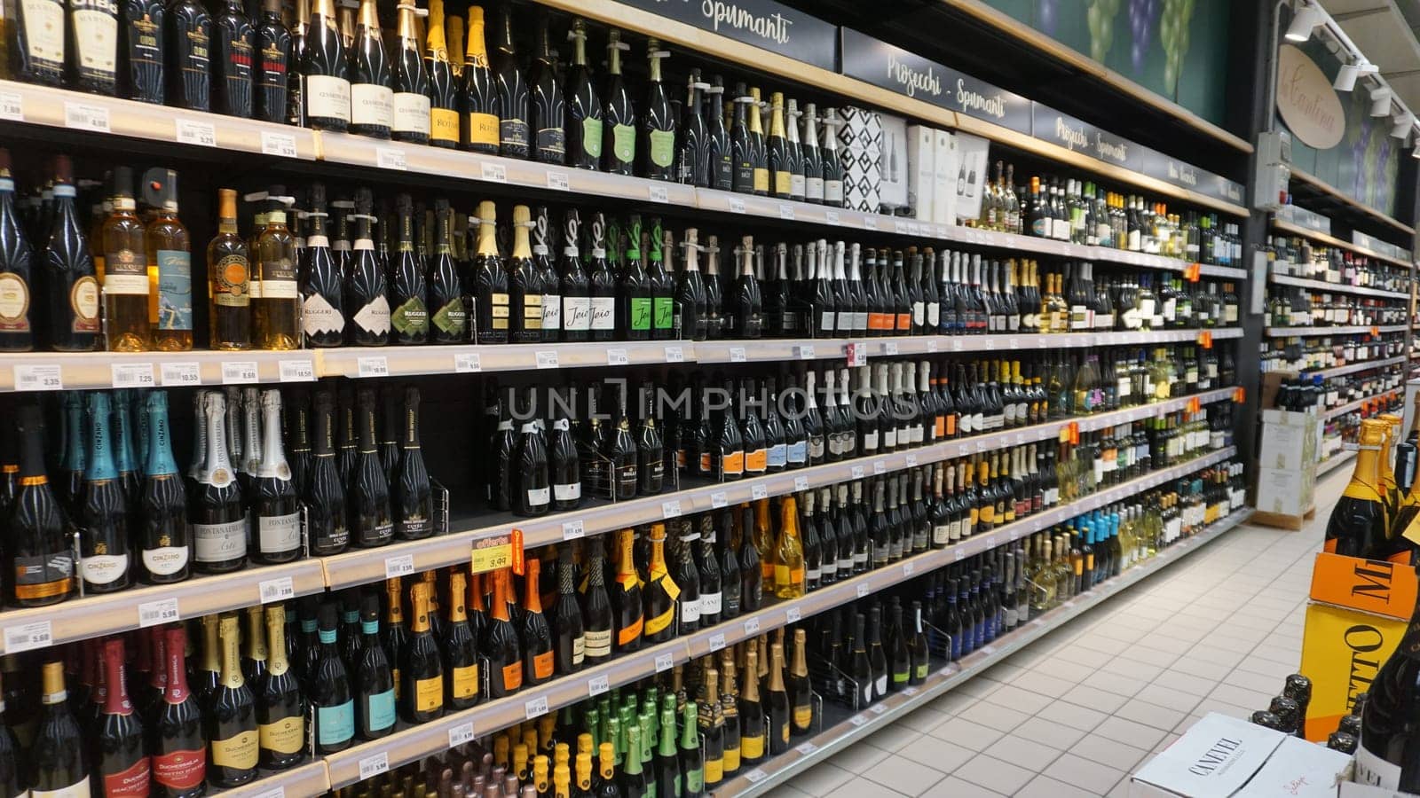 Lloret de mar, Spain - September 30, 2024: Retail shelves and display cases in a hypermarket Lidl trademark is a big supermarket at Lloret de mar, Spain