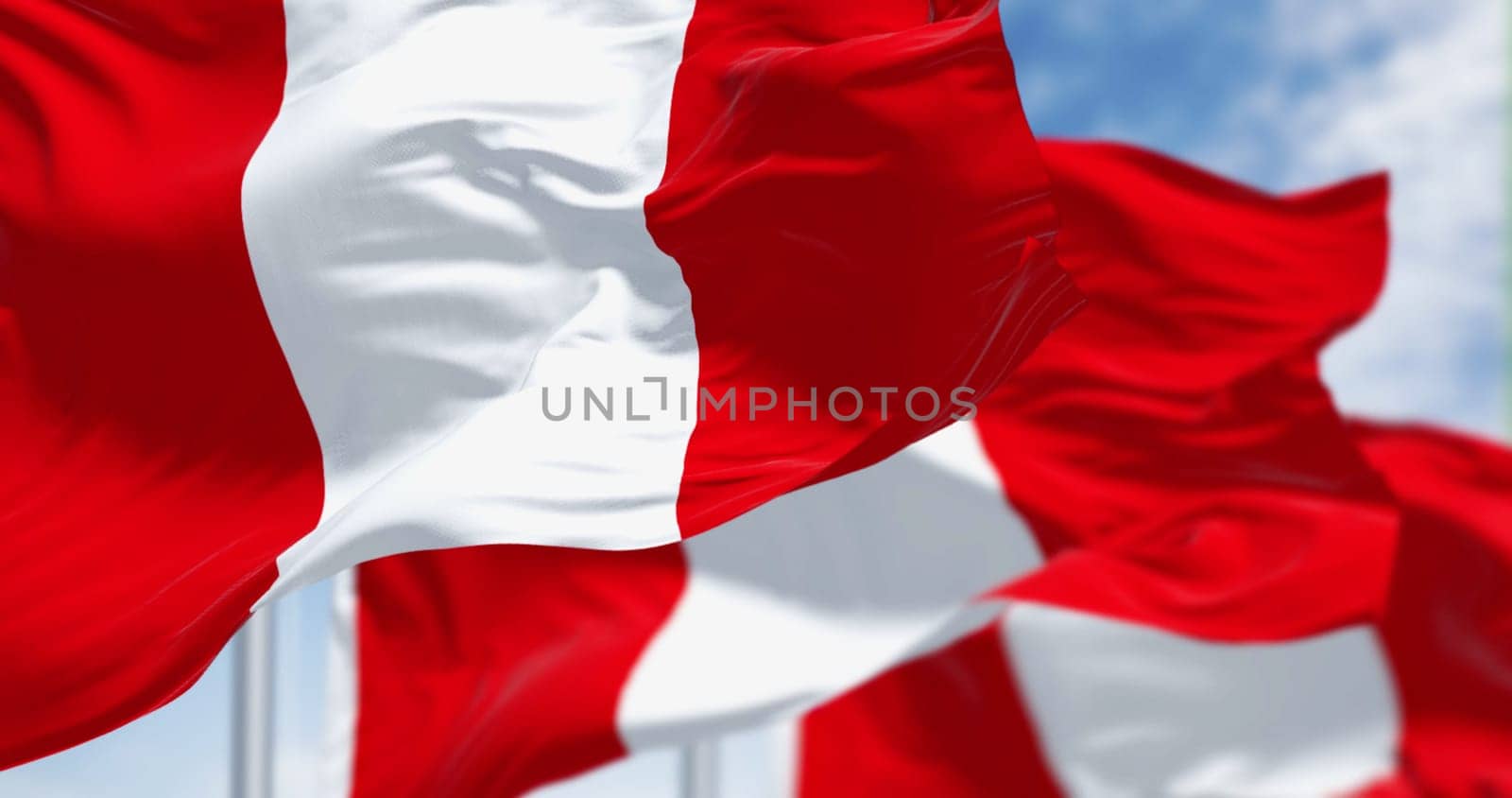 Close-up view of Peru national flags waving in the wind. The Republic of Peru is a country in western South America. 3d illustration render. Fluttering fabric