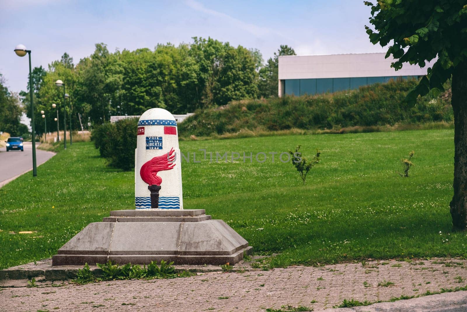 Bastogne, Belgium - July 17 2021: Last Milestone (1147) of the Voie de la Liberte 1944 (Liberty Road) near Mardasson Memorial. The Liberty Road is the commemorative way marking the route of the Allied forces starting on D-Day from Sainte-Mère-Église to end in Bastogne