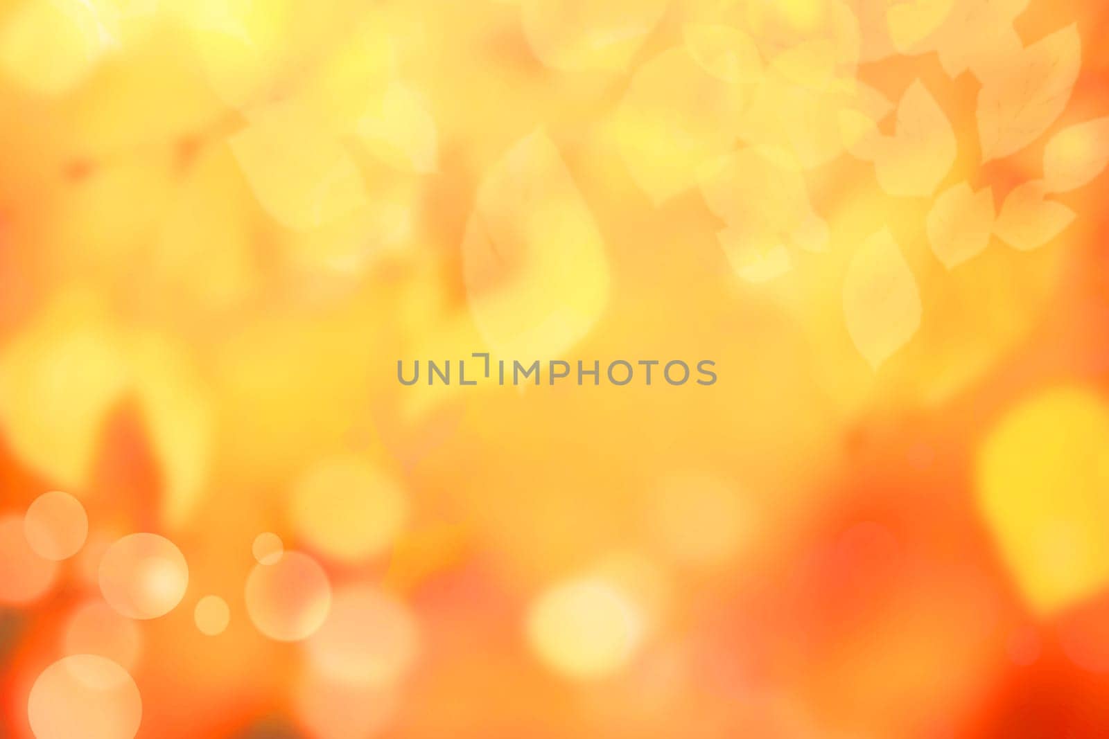 Hello autumn background. Abstract autumn gradient gold yellow orange bright background texture with leaves and bokeh circles. Indian summer. Card design with space text. Beautiful backdrop.