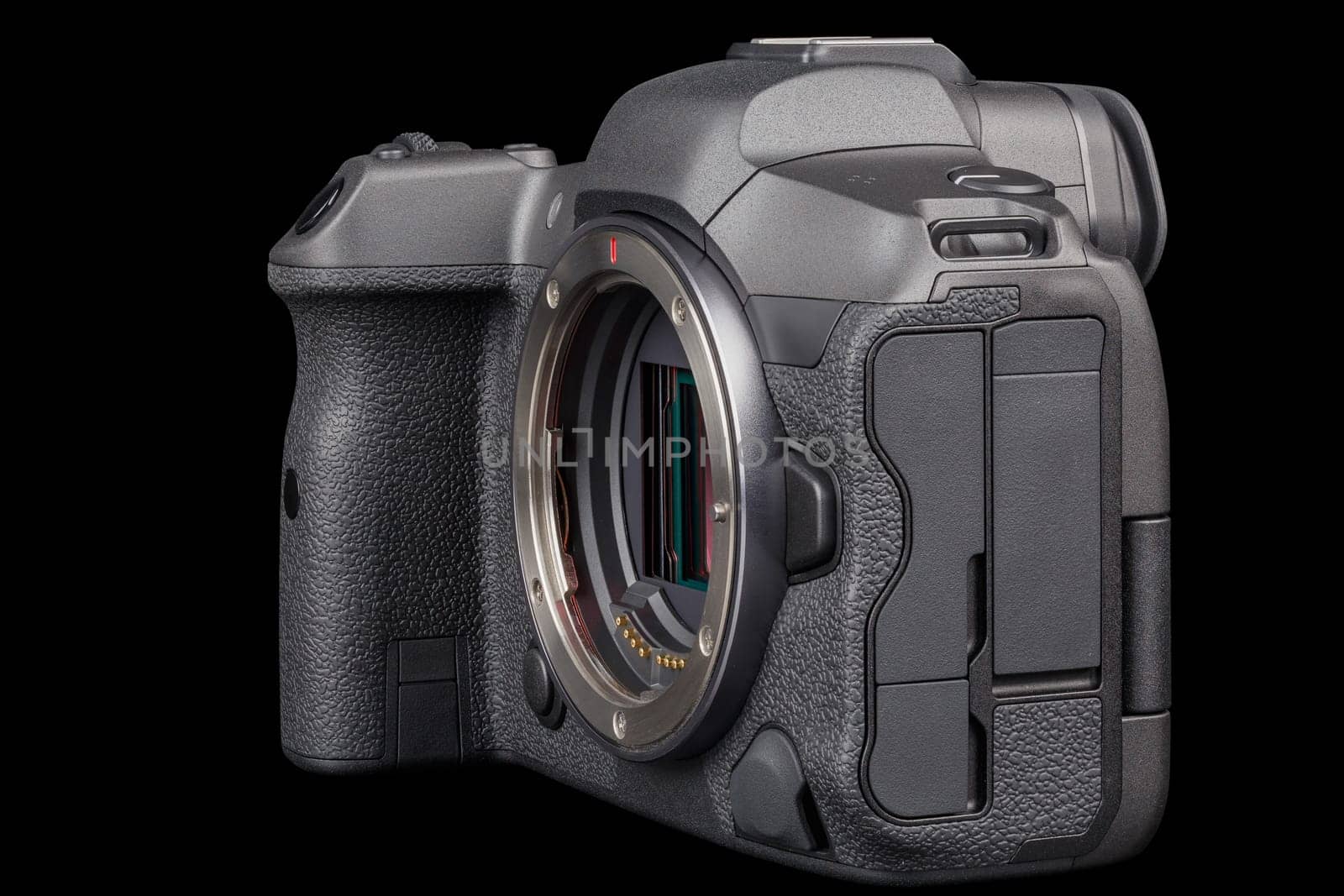 black 2020s professional 35mm full-frame mirrorless camera body with flip screen isolated on black background.
