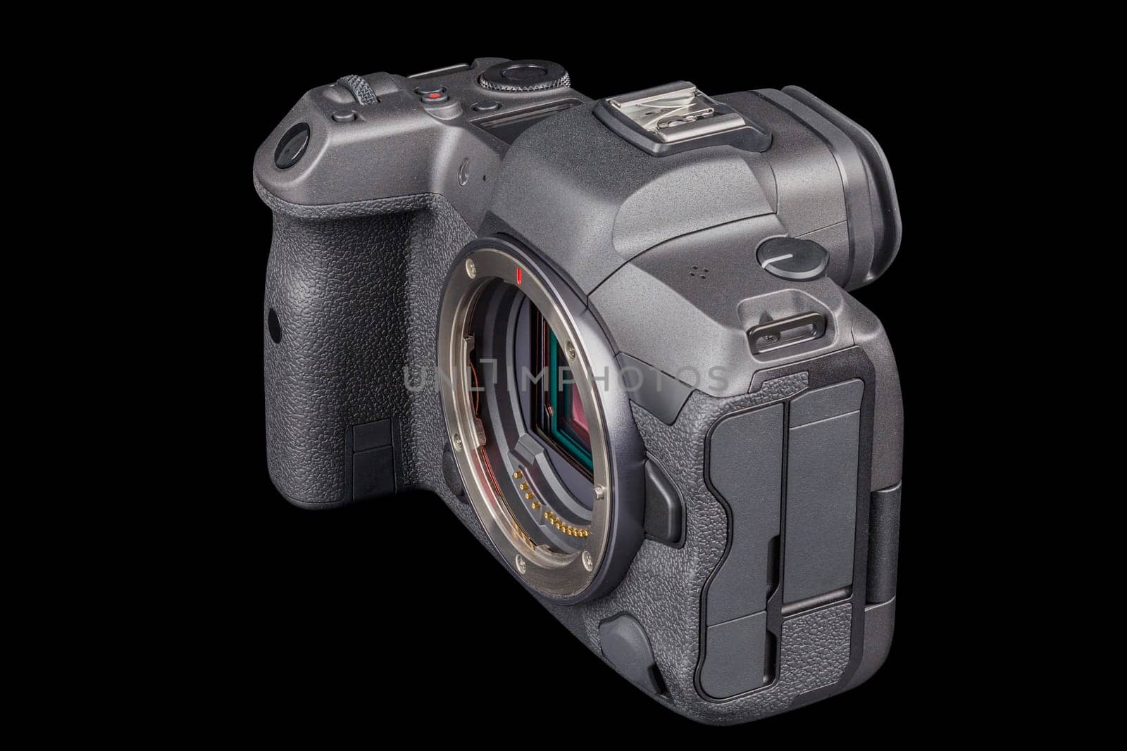 black 2020s professional 35mm full-frame mirrorless camera body with flip screen isolated on black background.