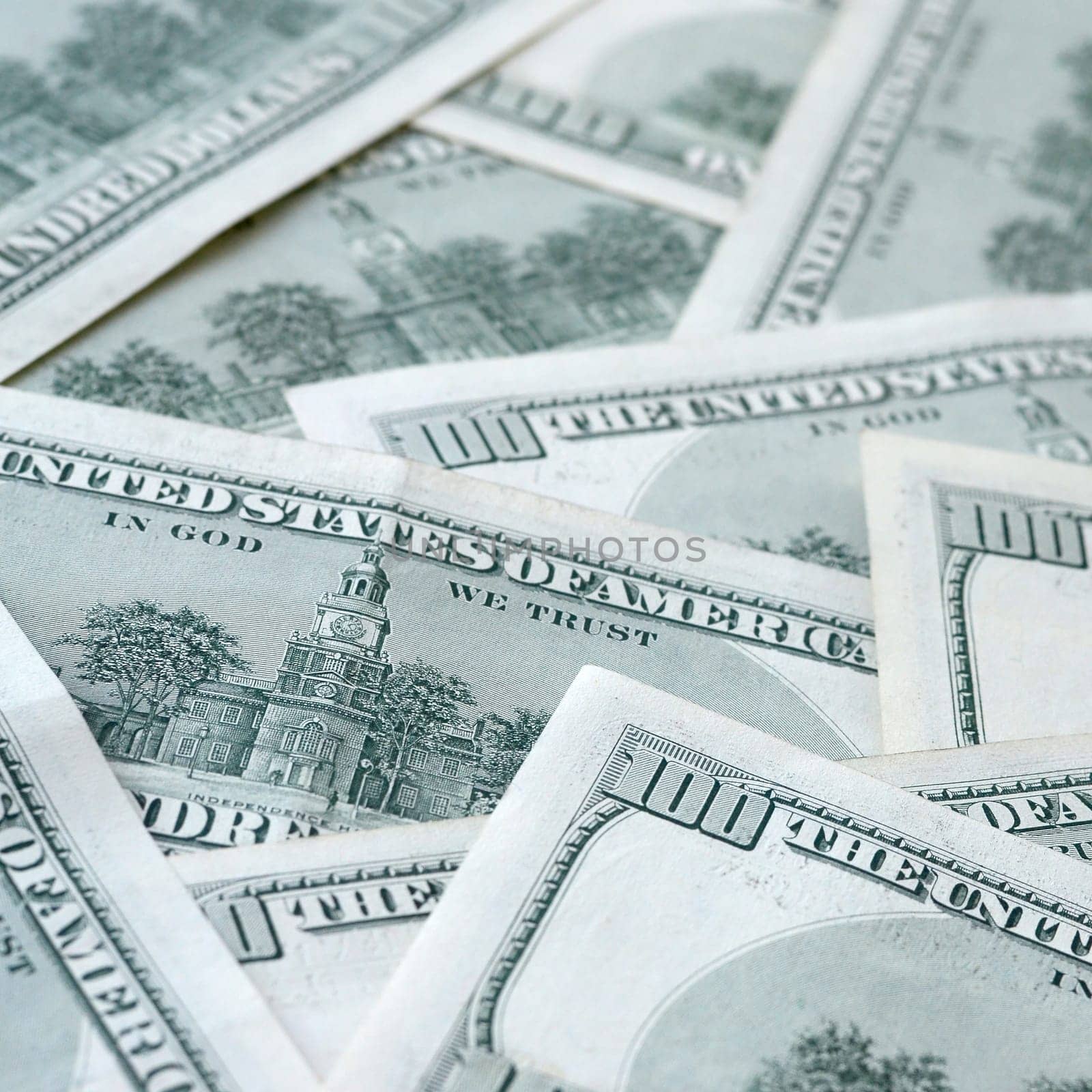 Background of 100 dollar bills. Abstract textured backdrop with many hundred money bills. Rich life concept. Huge amount of american funds