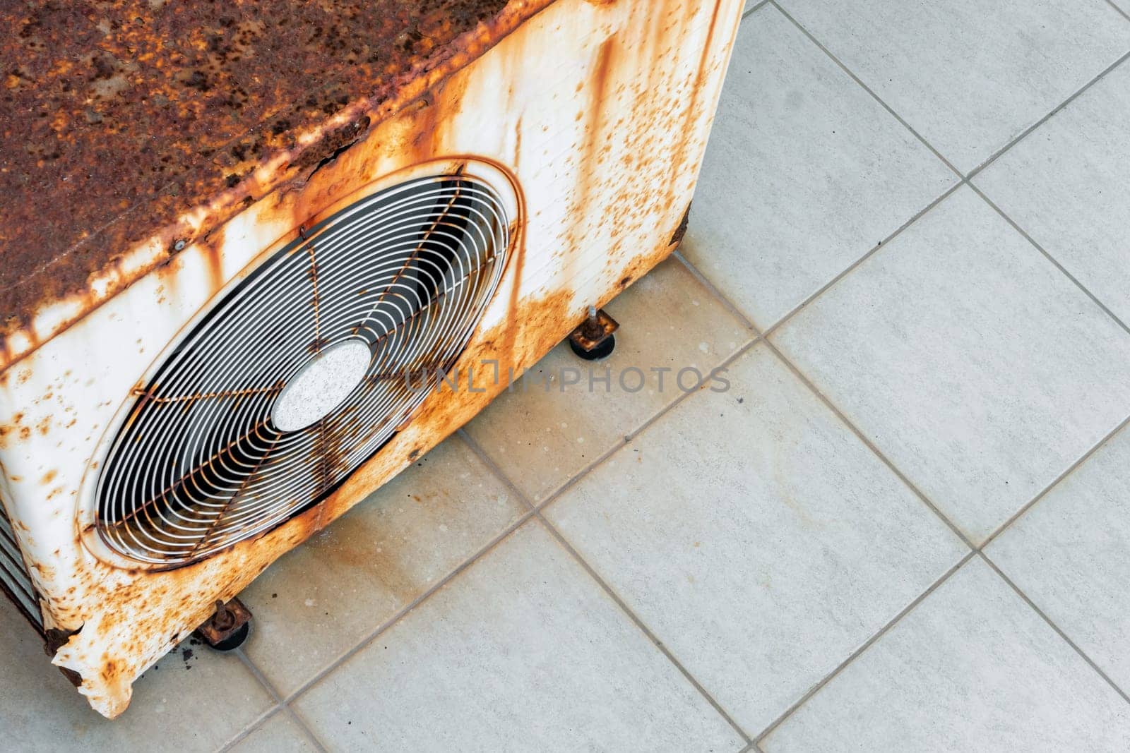 Close up of rusty dirty metal ventilator of old air conditioning system