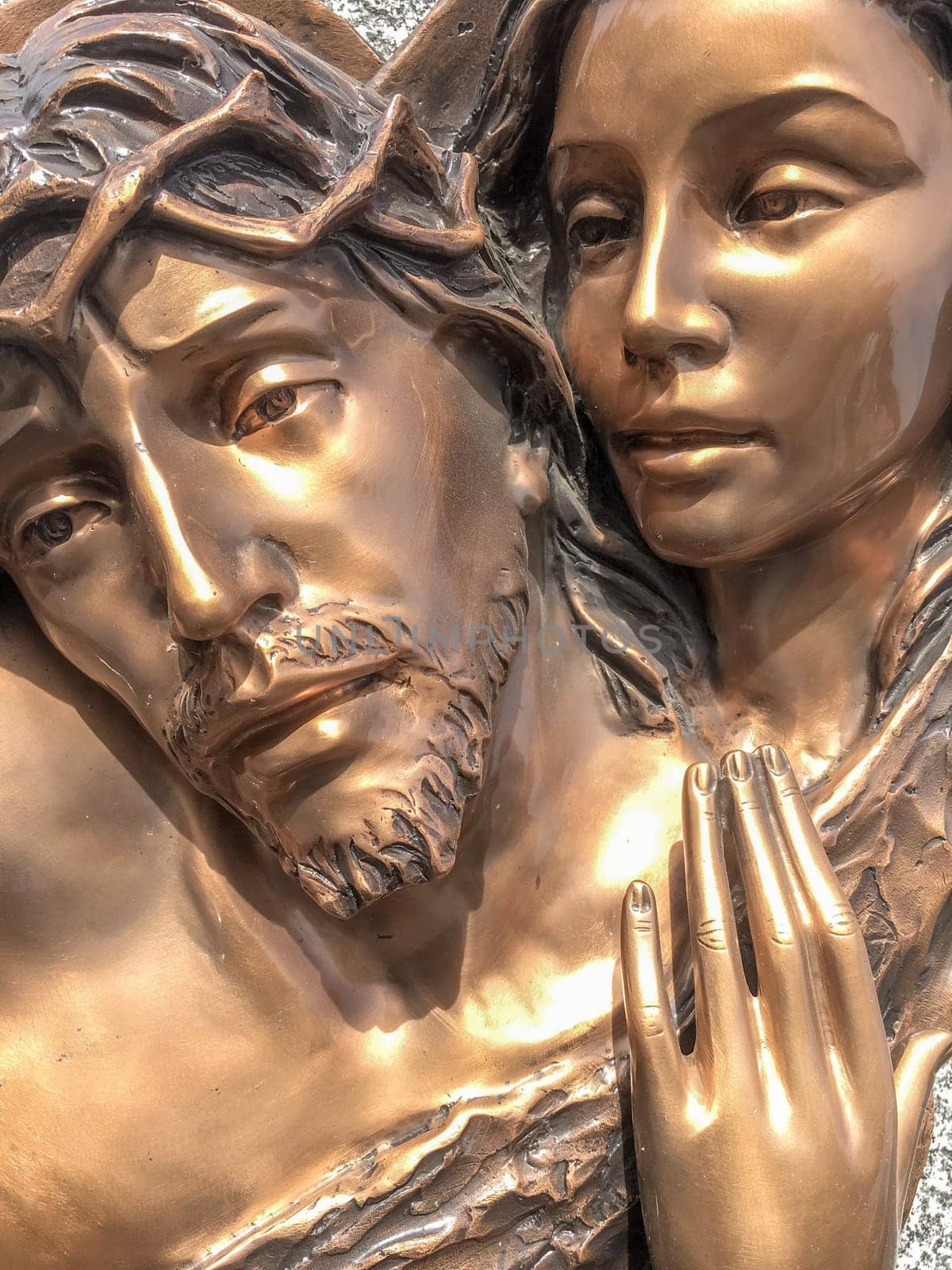 Mary and Jesus bronze statue. Death of Jesus. Resurrection. Easter.