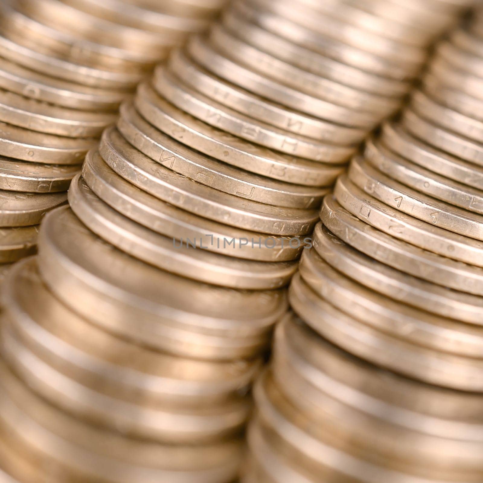 Large pile of big golden coins. Financial success money background for rich life concepts, banking and profit in Ukraine
