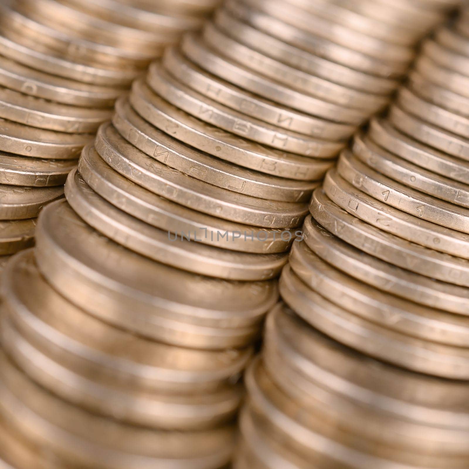 Large pile of big golden coins. Financial success money background for rich life concepts, banking and profit in Ukraine