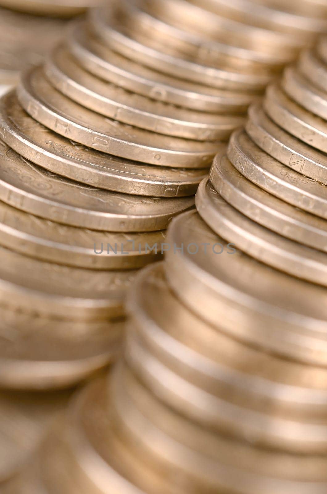 Large pile of big golden coins. Financial success money background for rich life concepts, banking and profit in Ukraine