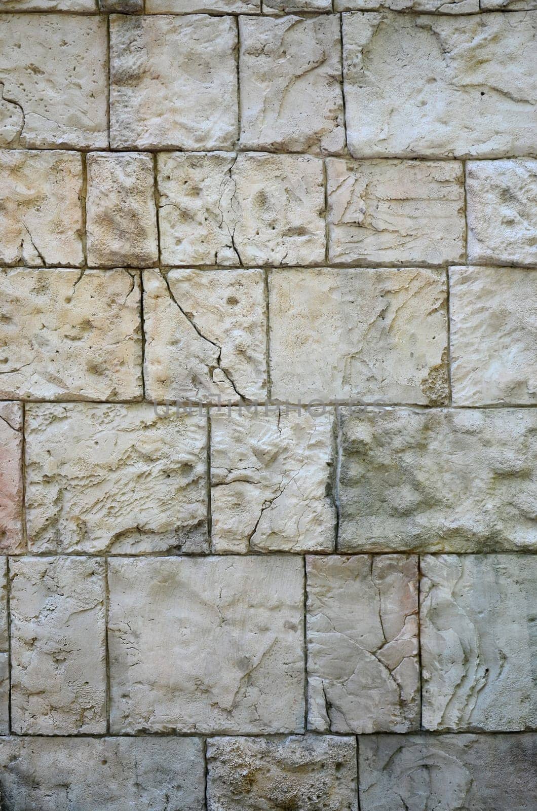 Fragment of ancient walls of fortification with large boulders. Big brick wall texture