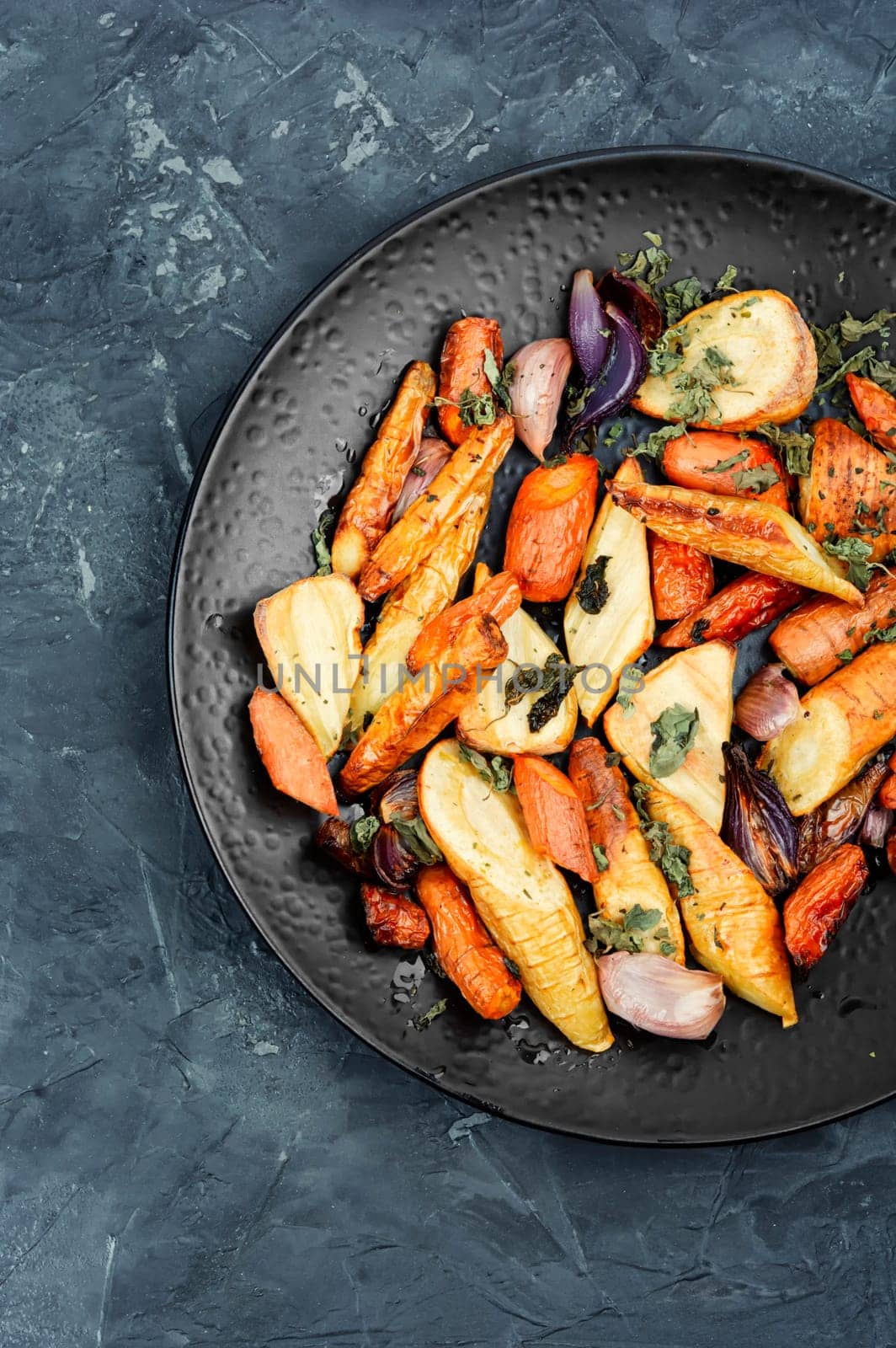 Colorful grilled and roasted root vegetables.