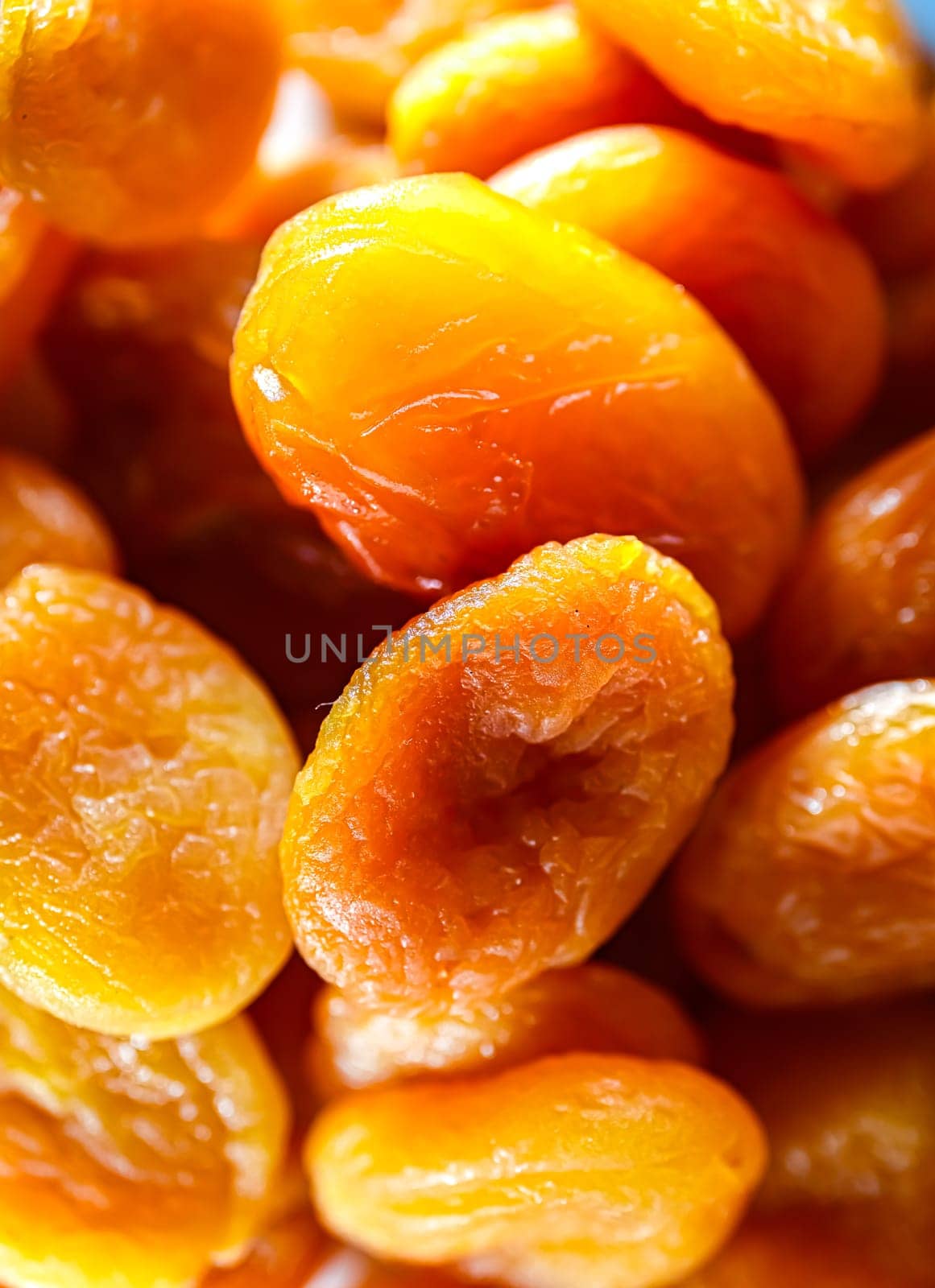 Close-up of soft apricots, dried and pitted.