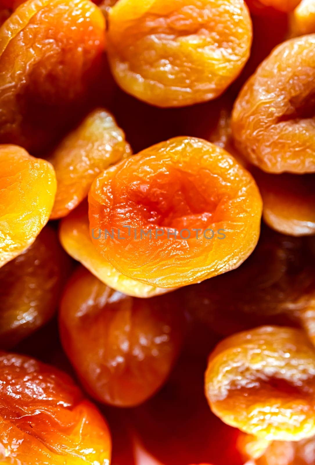 Close-up of soft apricots, dried and pitted.