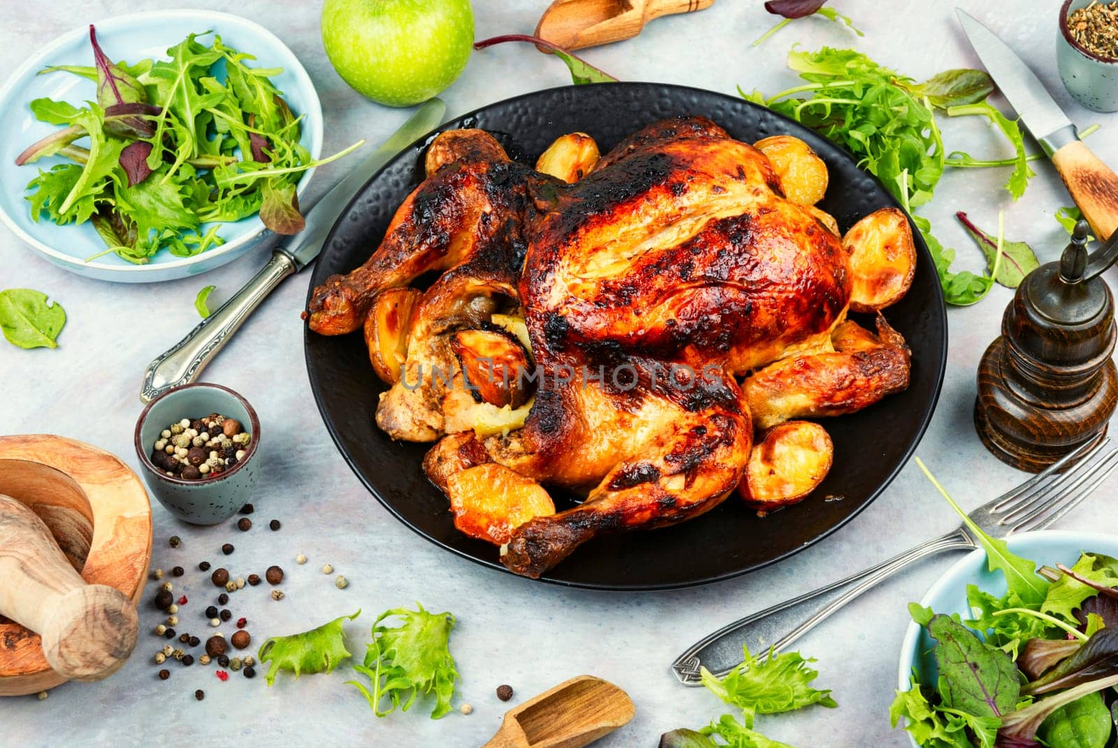 Delicious looking freshly roasted chicken. Braised chicken with aromatic herbs.