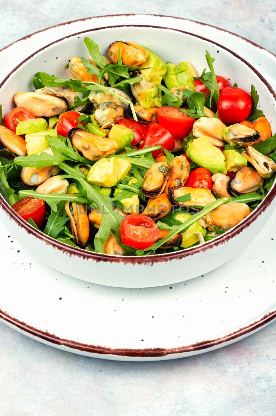 Fresh vegetable salad with mussels.