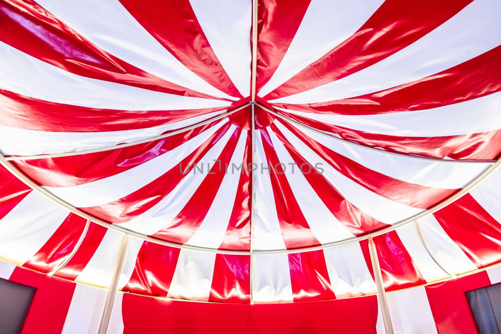 Circus tent background. Colorful design, striped white and red, retro entertainment.