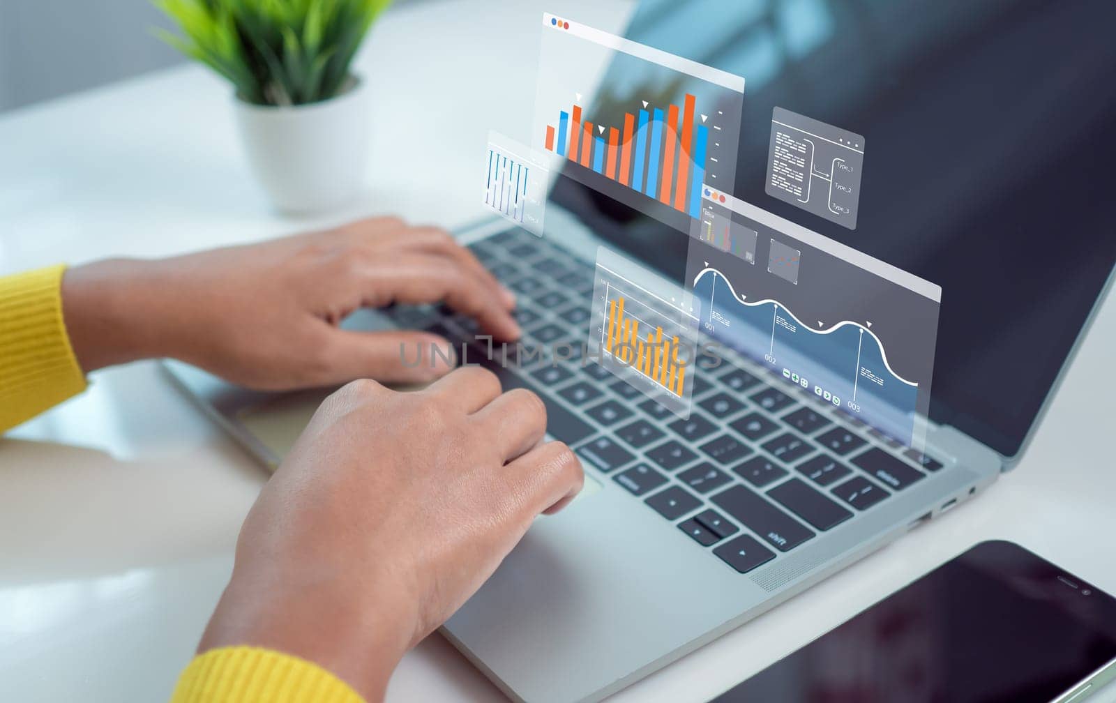 Business woman use computers to analyze business and manage corporate data, Business analytics with charts, Metrics and KPIs to improve organizational performance, financial organization strategy.