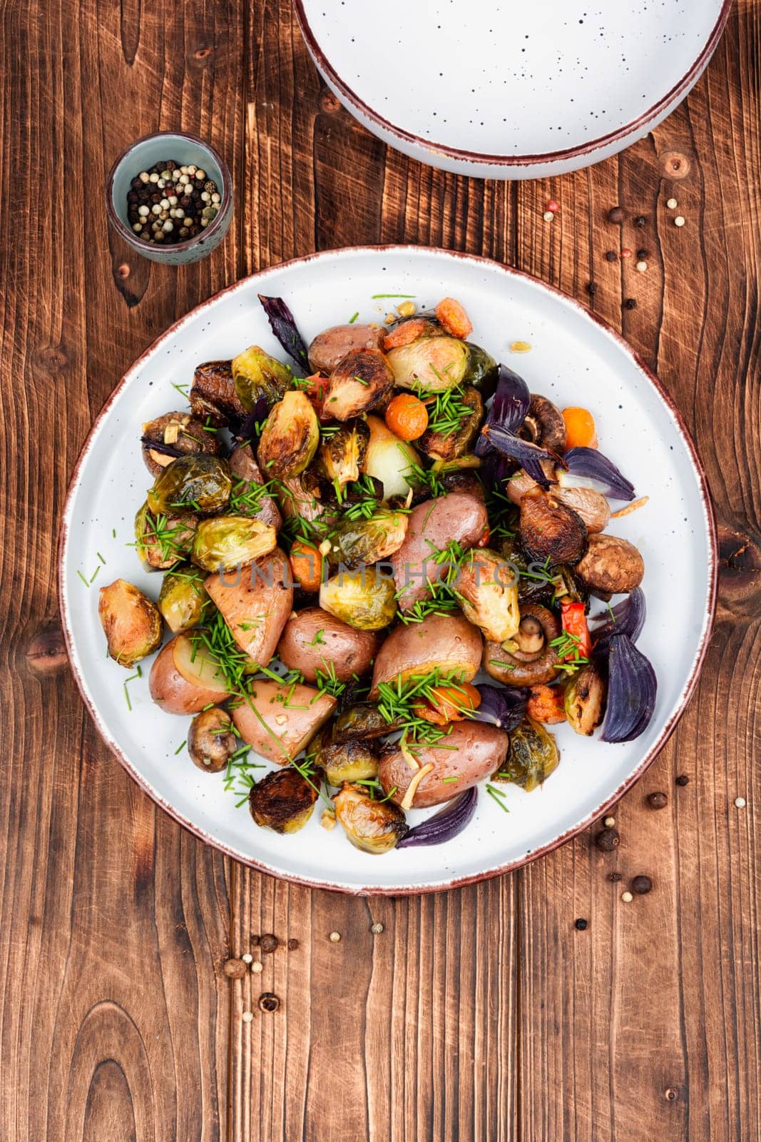 Brussels sprouts and potatoes caramelized. Healthy eating. Copy space.