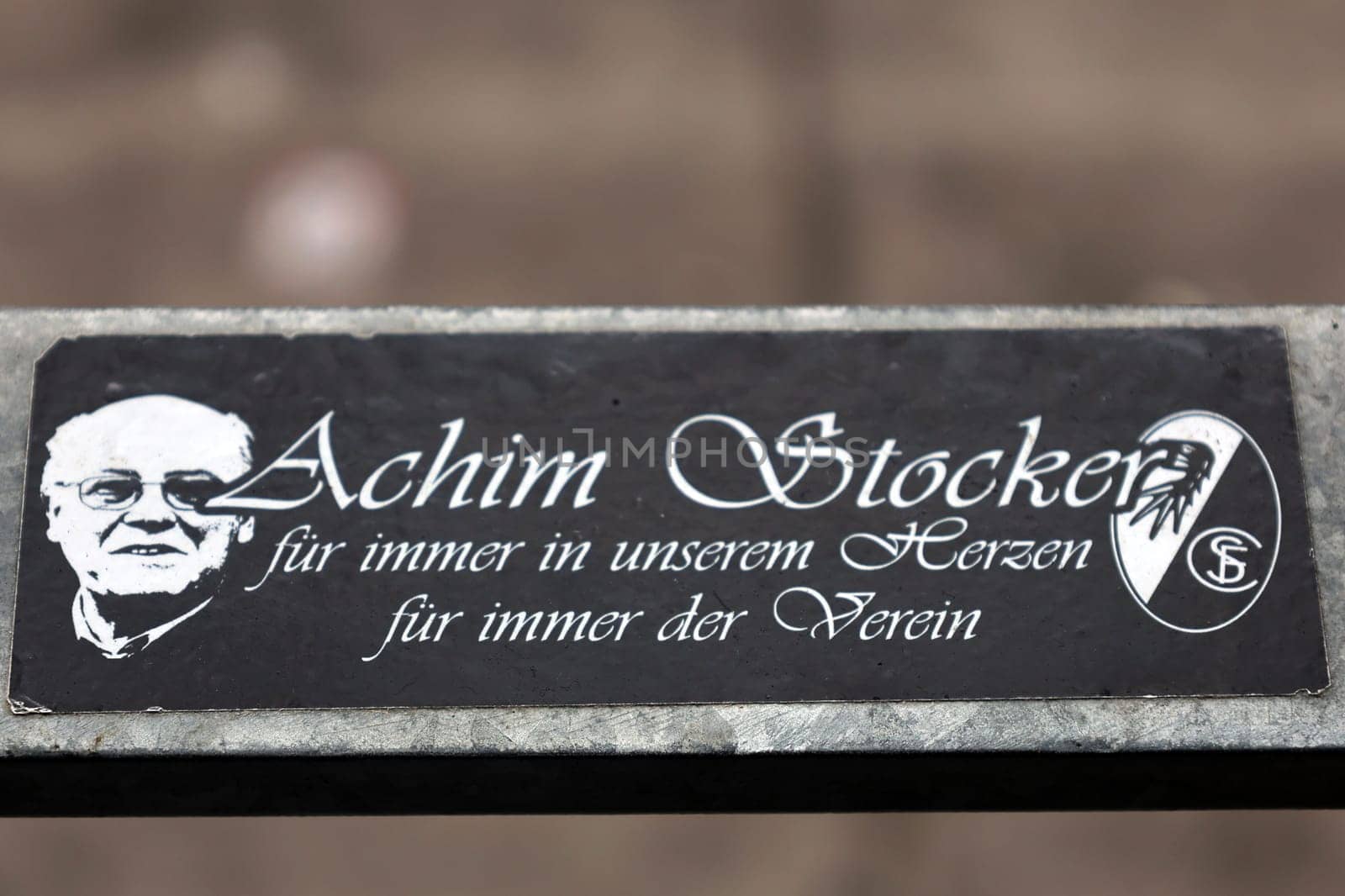 On the grandstand of the Europa Park Stadium,a small plaque commemorates former president Achim Stocker,who died on 1 November 2009