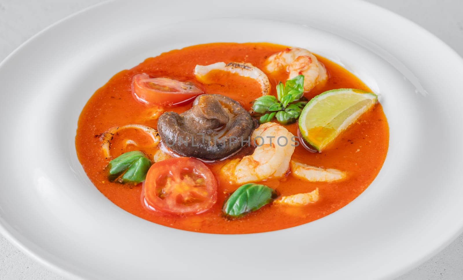 Portion of thai seafood tom yum soup