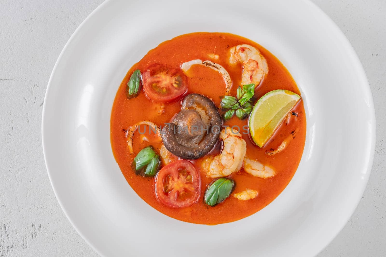 Portion of thai seafood tom yum soup