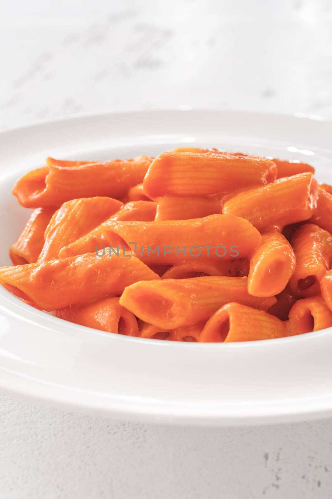 Penne pasta with bell pepper and cream sauce