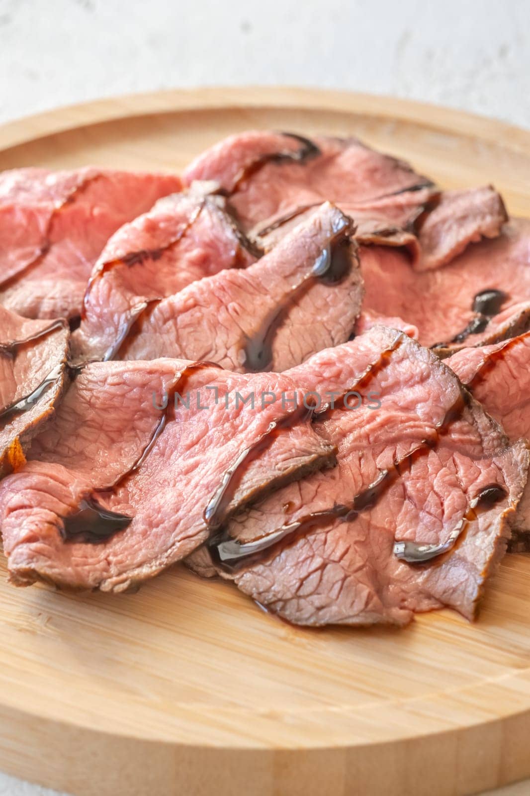 Portion of sliced roast beef on the plate