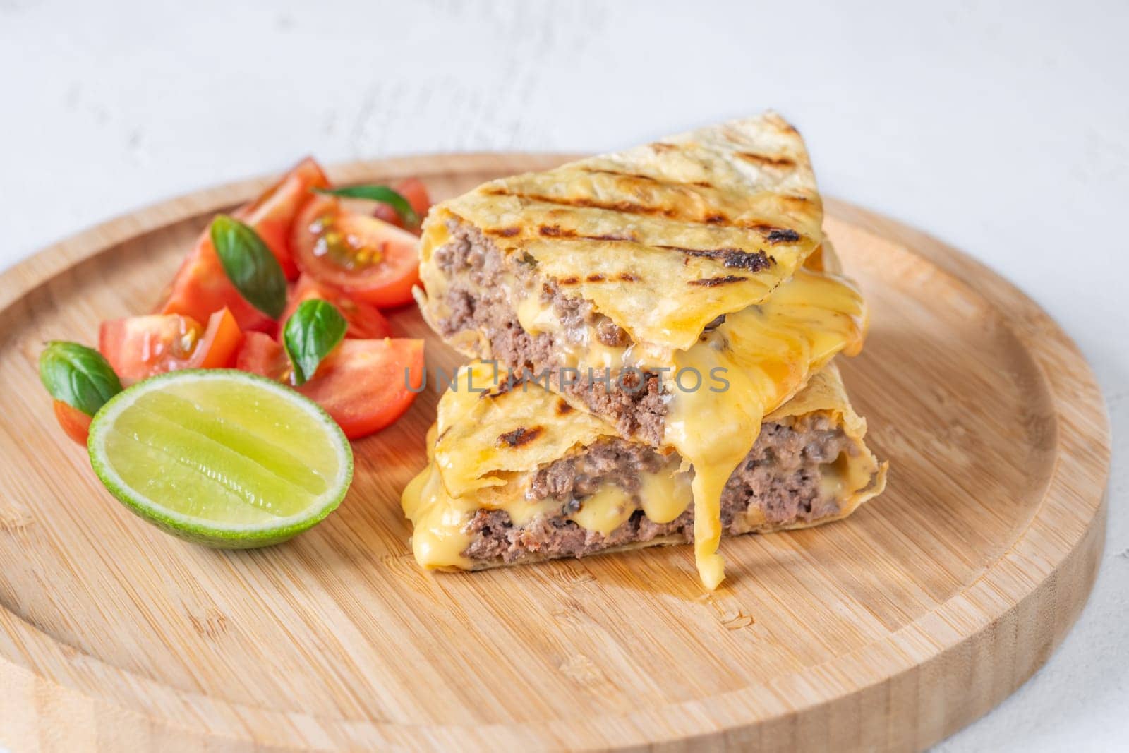 Portion of taco with beef mince and cheese