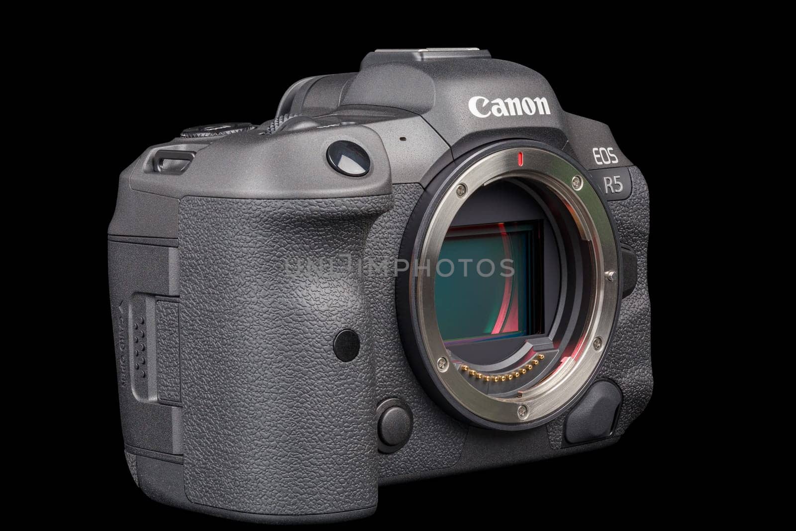 Canon R5 - black professional 35mm full-frame mirrorless camera body with flip screen isolated on black background with focus stacking - Tula, Russia, September 15, 2021